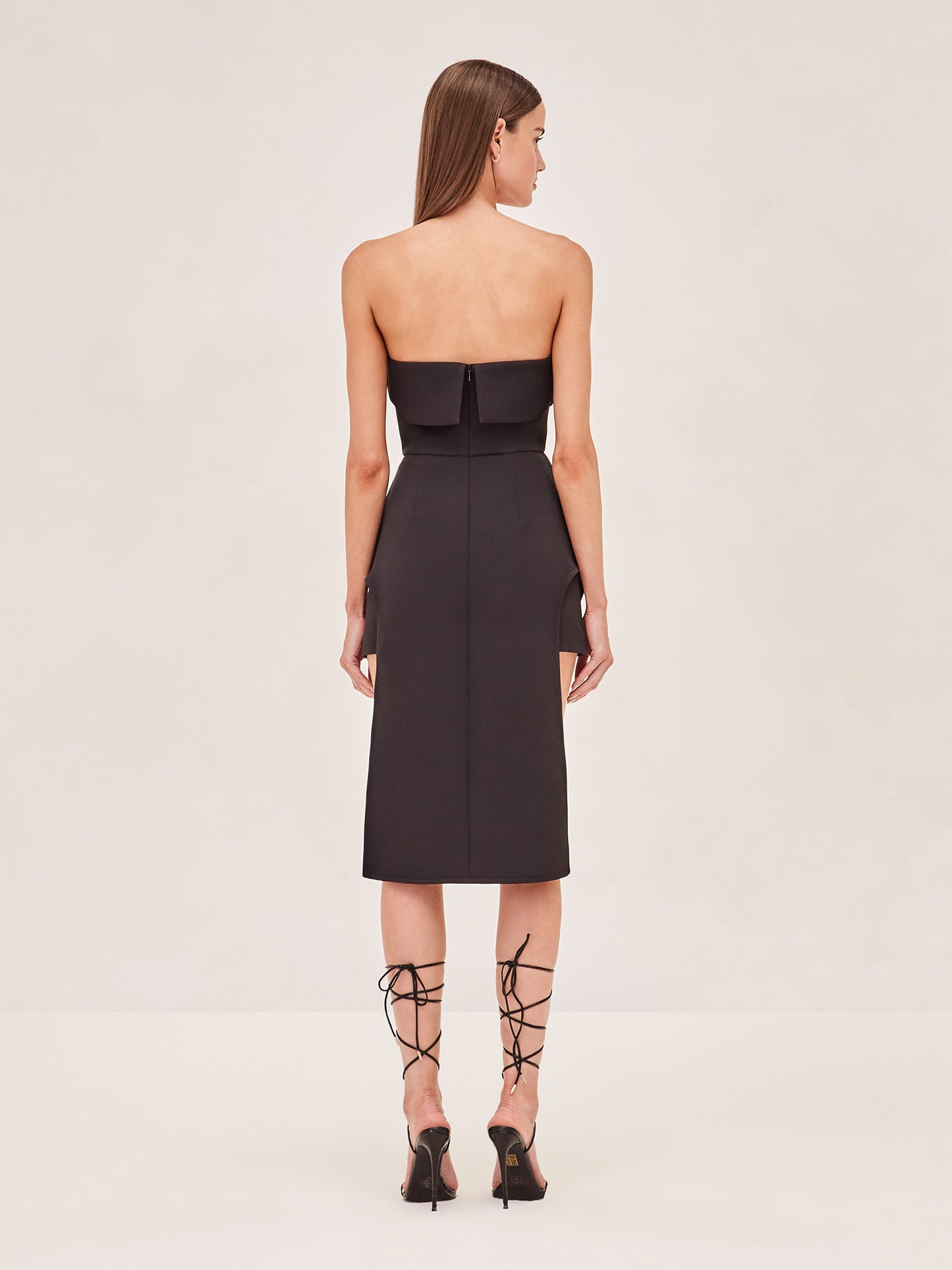ALEXIS Akera strapless top in black back image.
