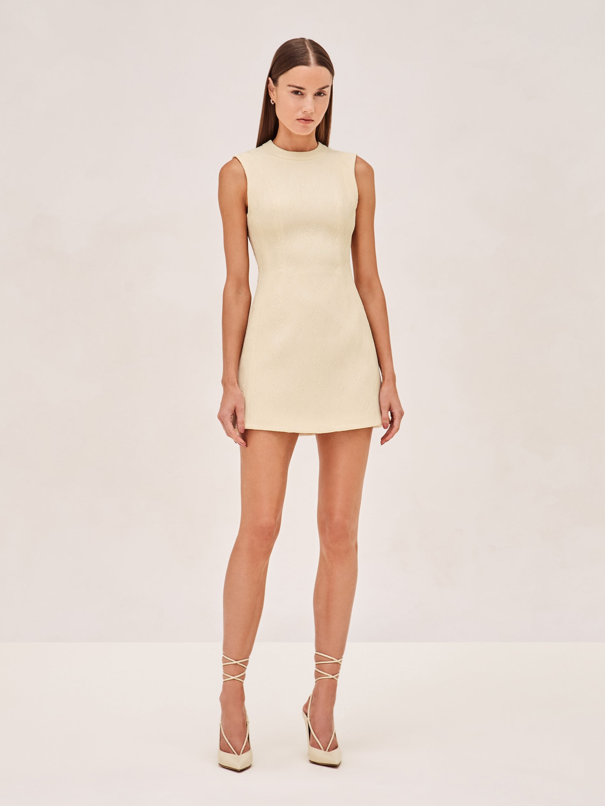 Alexis Andria sleevless mini dress in ivory.