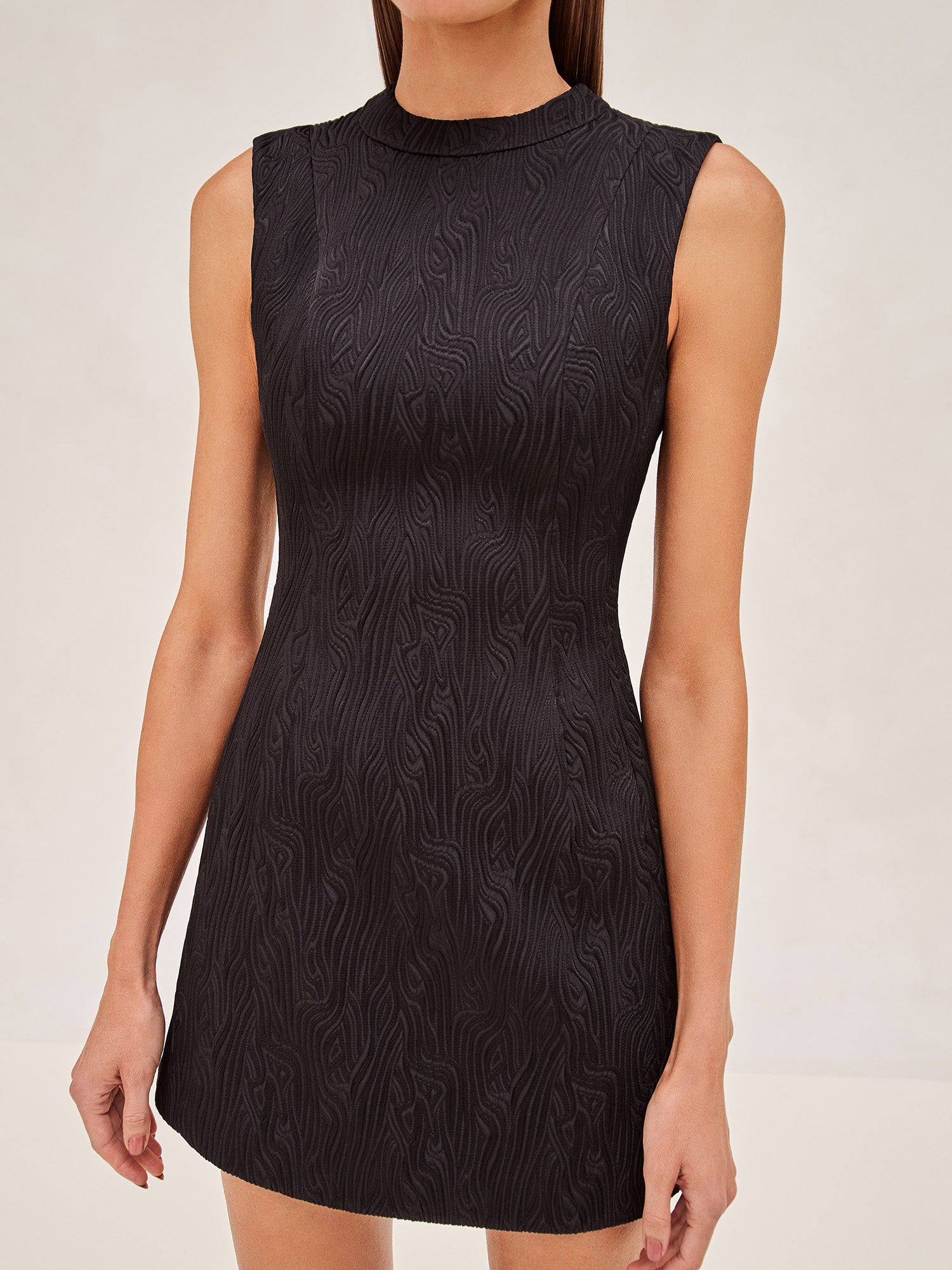 Alexis Andria sleevless mini dress in black.