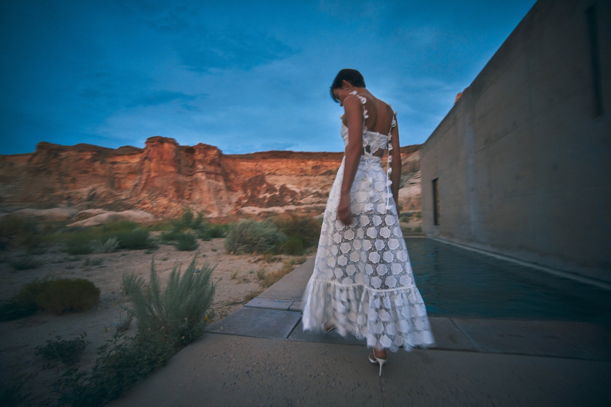 ALEXIS Armas romper in white lace with removable cape skirt  back image 