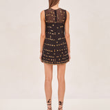 ALEXIS Avella Dress sheer mini dress with a black slip. Adorned with topaz stones