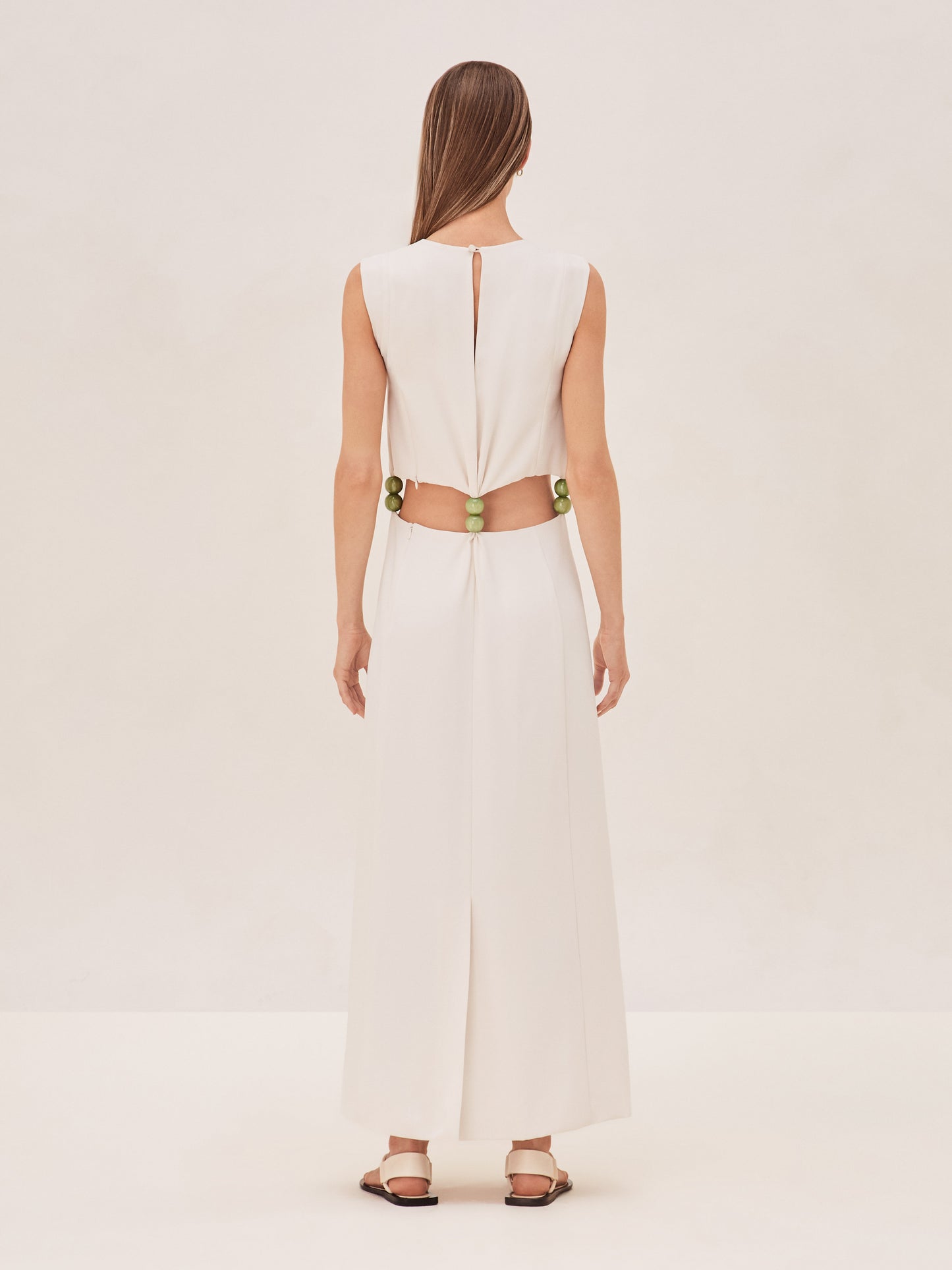 ALEXIS coppola ivory sleeveless dress with jade beaded detail and stomach cut outs back image