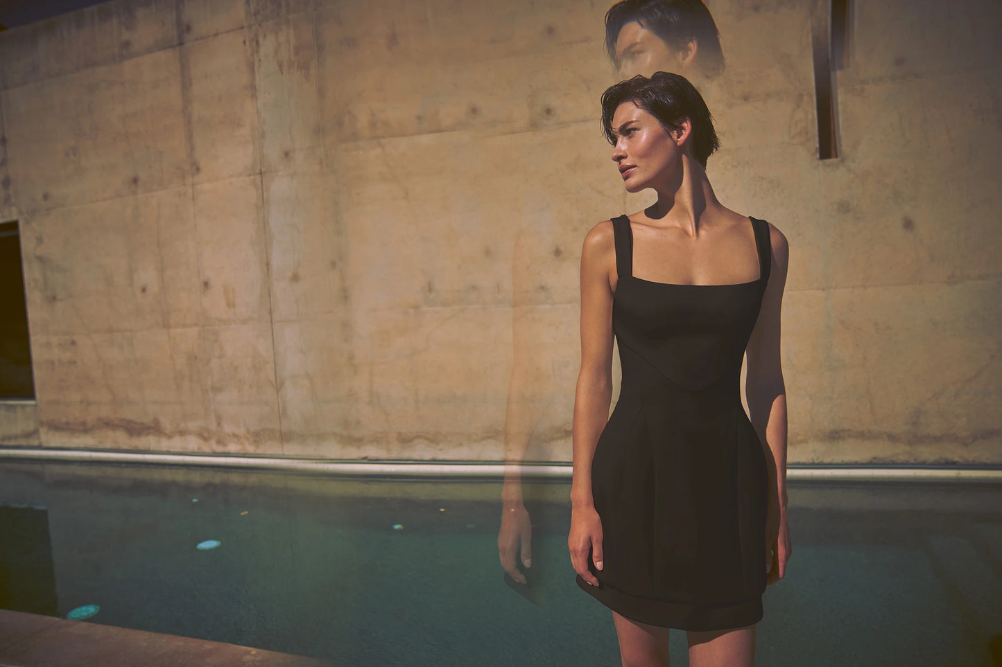 ALEXIS Gineva sleeveless mini dress in black campaign image