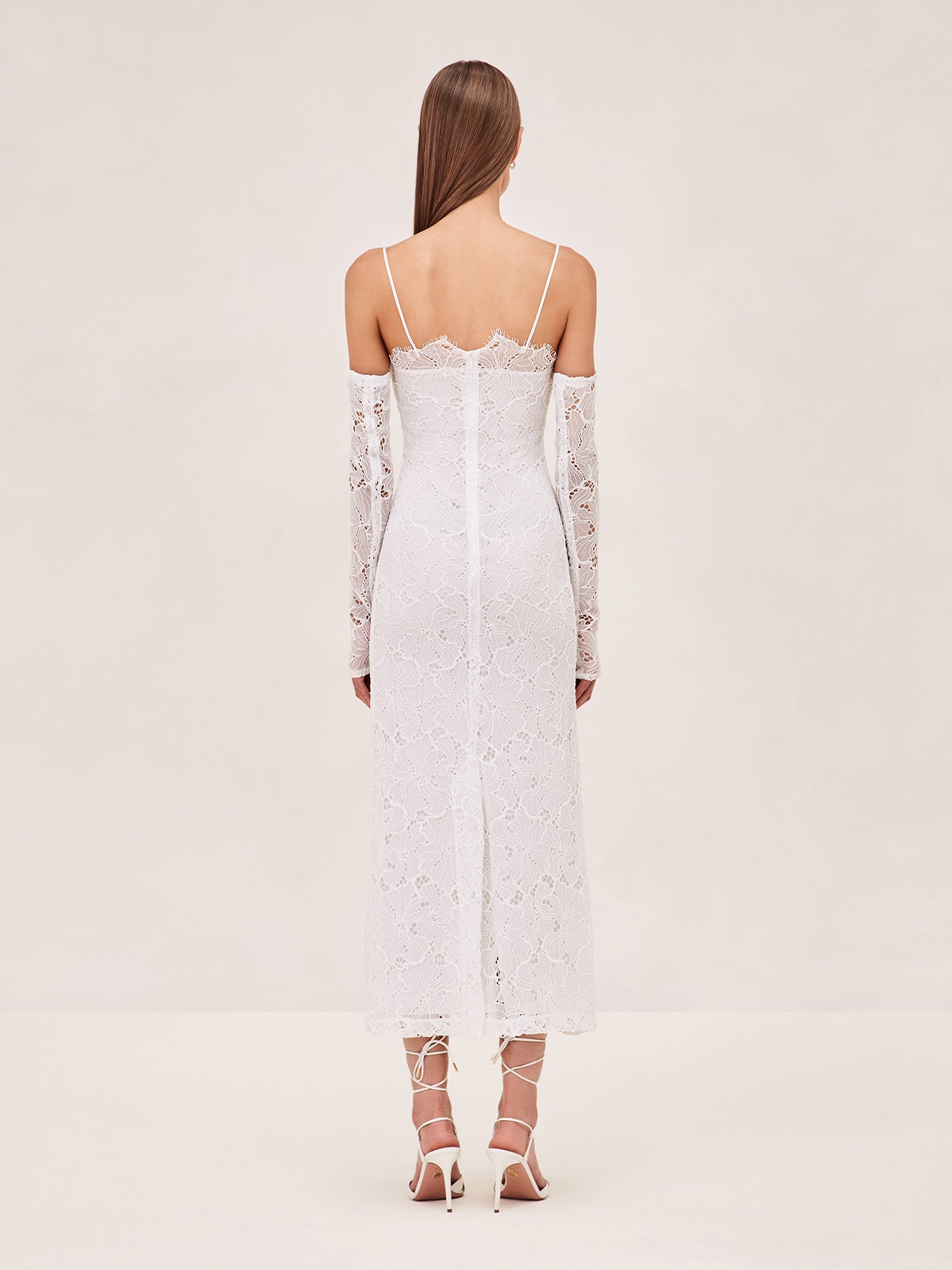 ALEXIS Rishell Lace midi dress with removable lining and sleeve gloves in white.