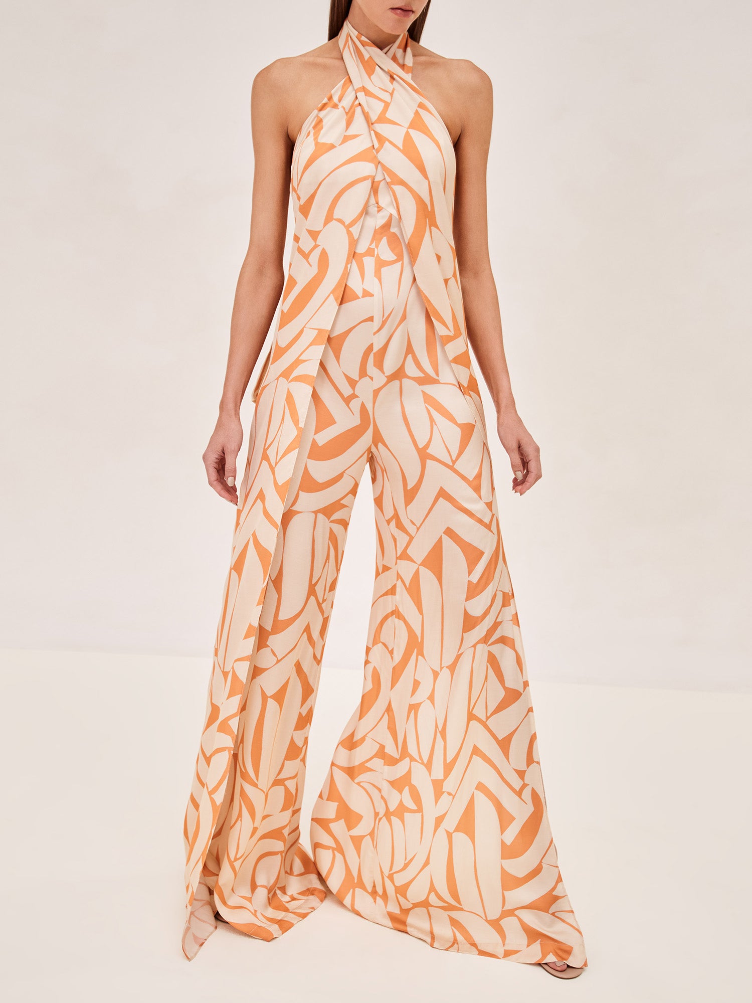 ALEXIS Seydou halter jumpsuit in melon mirage 