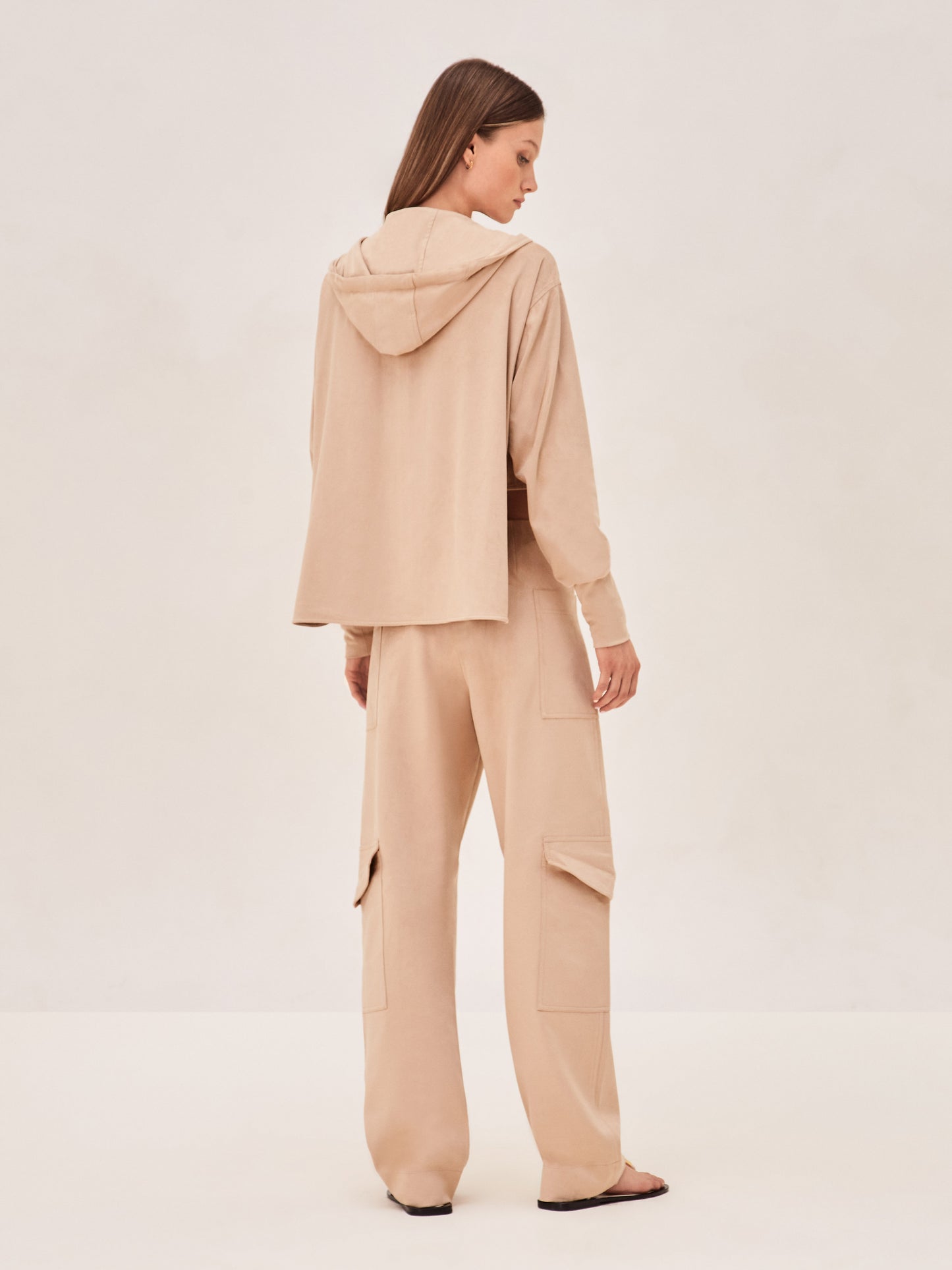 ALEXIS Suda top with zipper and hood. in camel