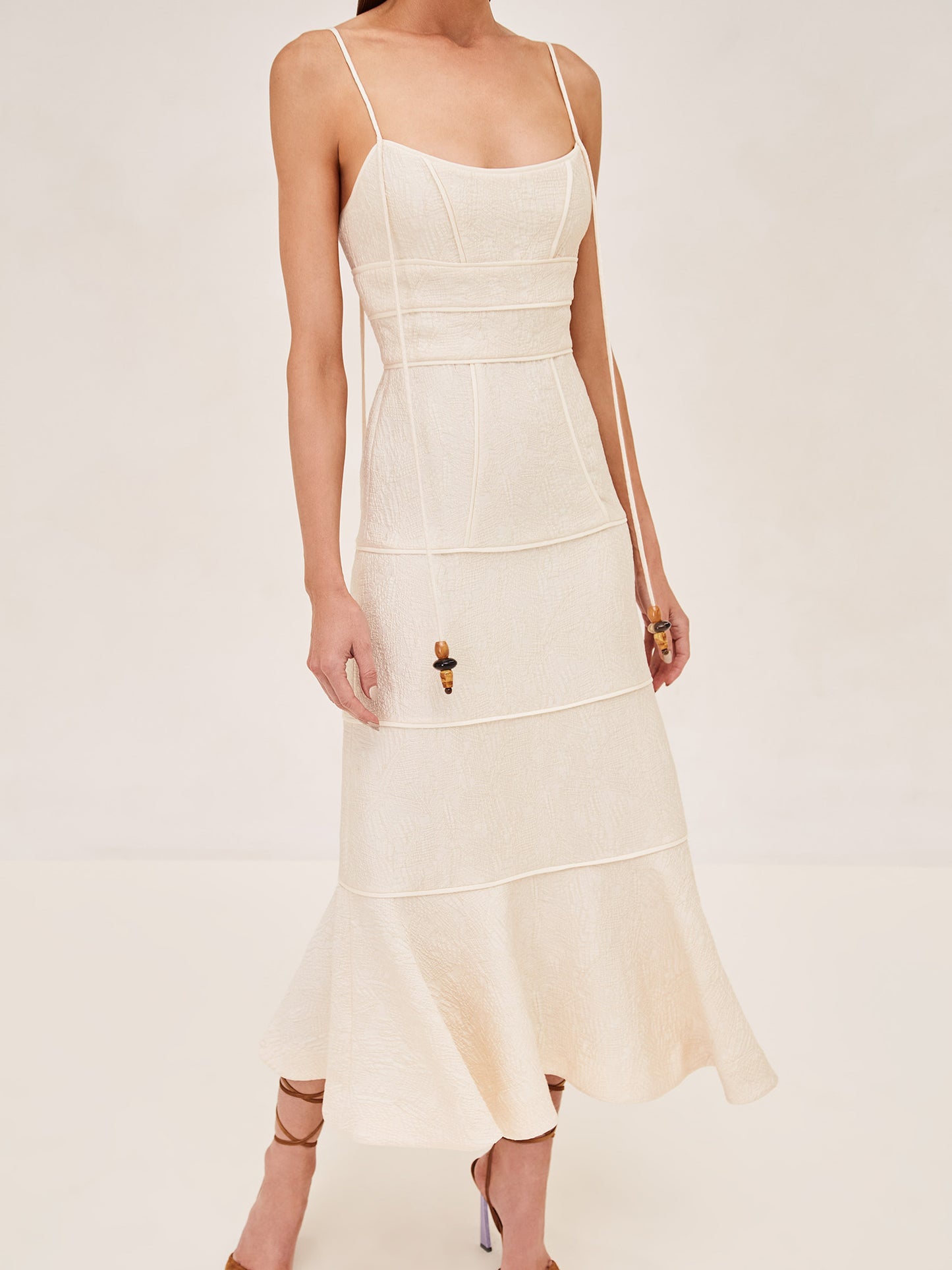 ALEXIS Vereda sleevless Midi dress with long staps and a bead detail on strap in ivory.