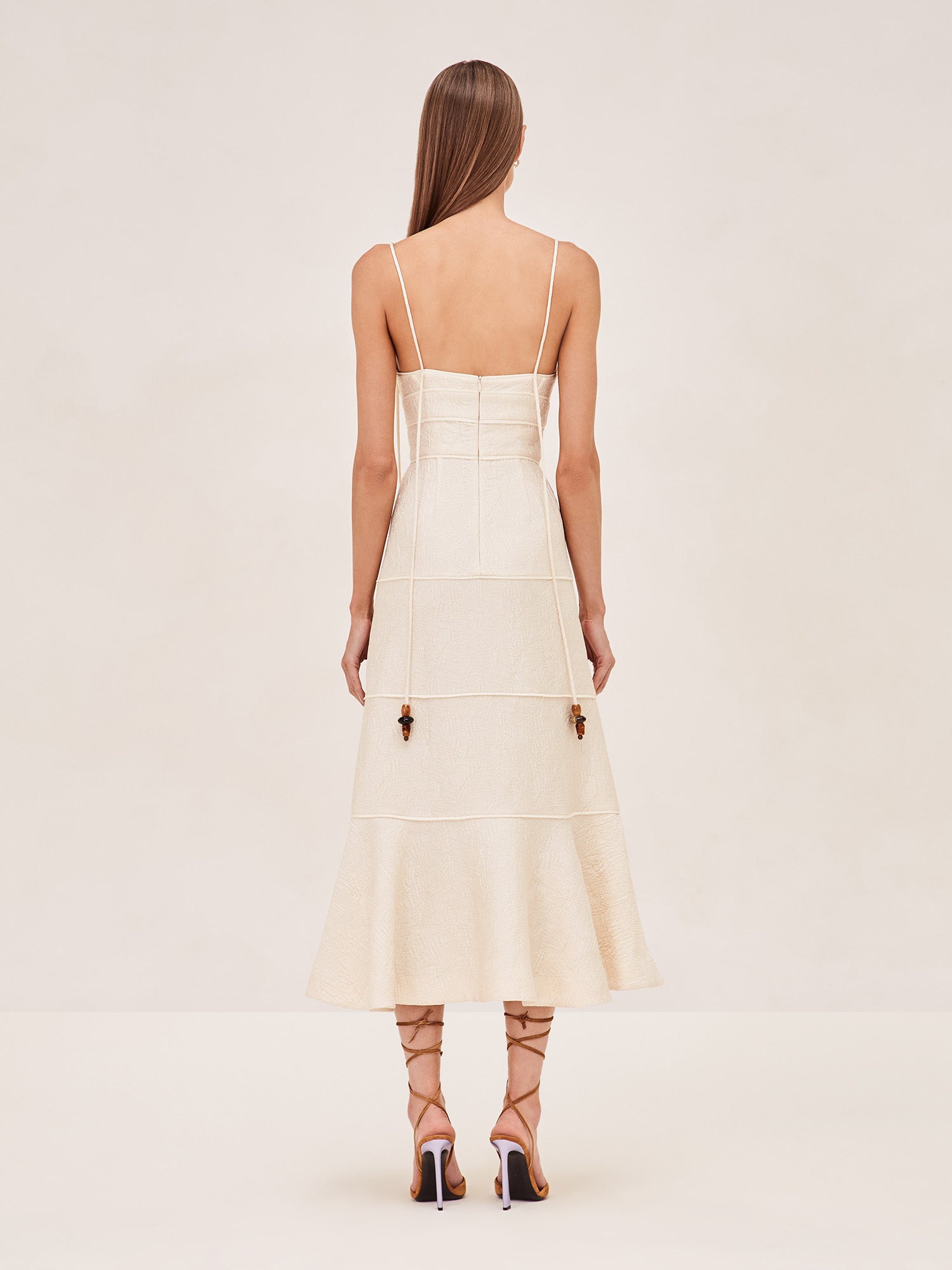 ALEXIS Vereda sleevless Midi dress with long staps and a bead detail on strap in ivory.