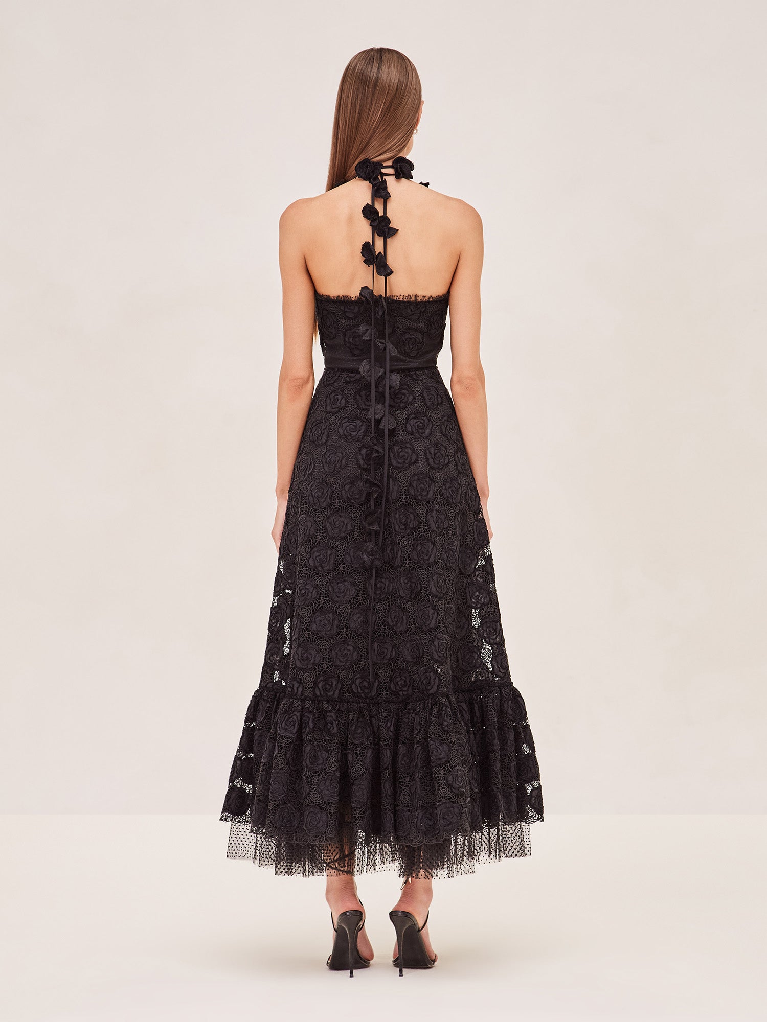 Alexis black lace midi dress with floral patterns and halter neck and removable skirt lining.