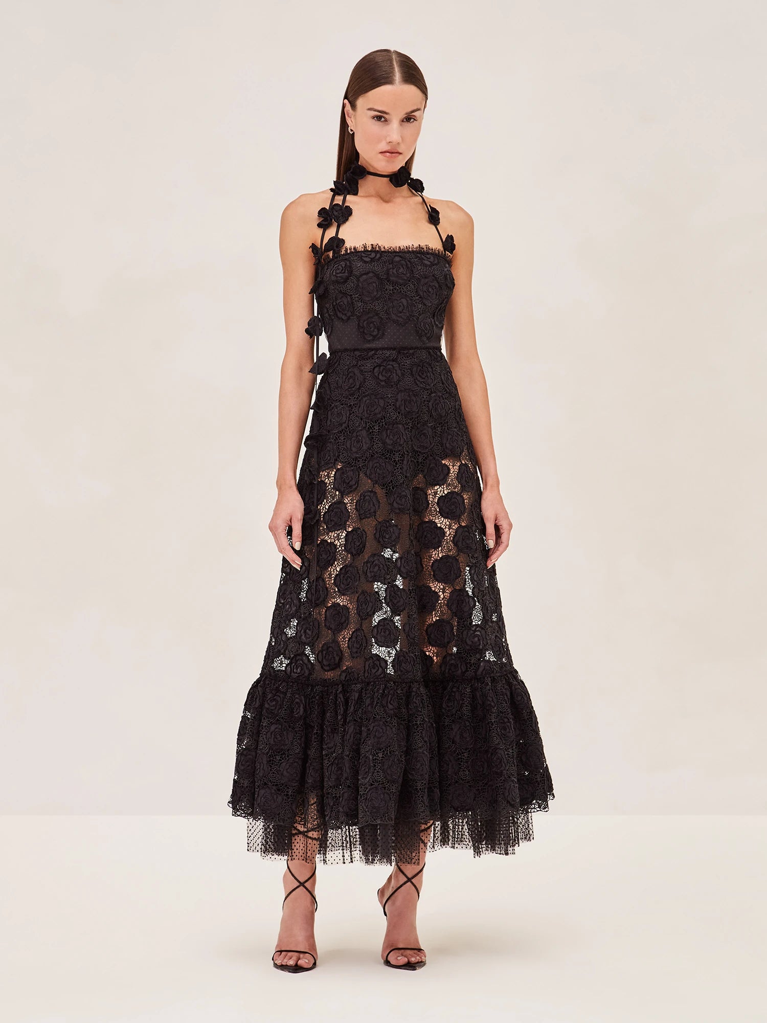 Alexis black lace midi dress with floral patterns and halter neck and removable skirt lining.